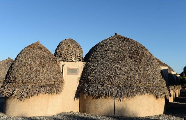 İran'da hurma yapraklarından inşa edilen otel turistlerin ilgi odağı