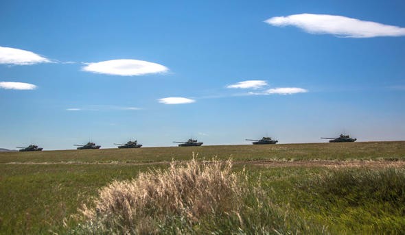 Putin Türk kökenli bakan ile Vostok-2018'i izledi