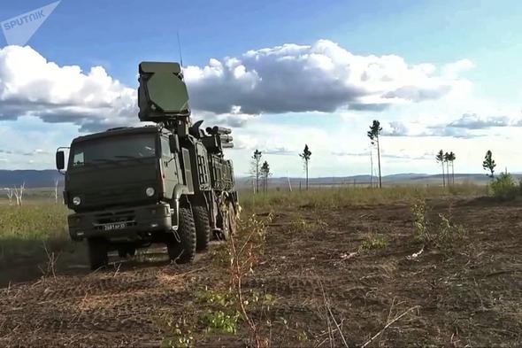 Putin Türk kökenli bakan ile Vostok-2018'i izledi