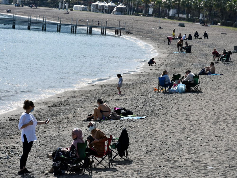 Marmaris'te güneşli havayı gören sahile koştu